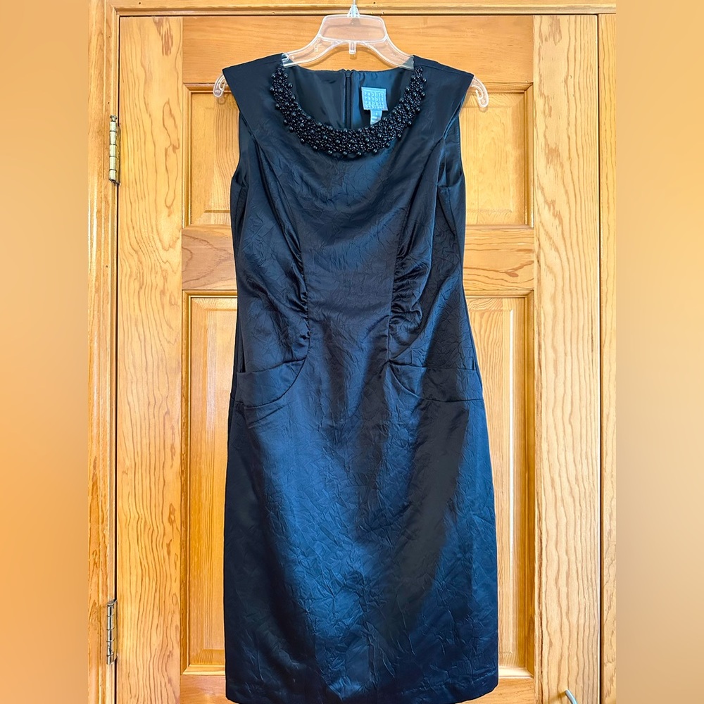 Black sleeveless cocktail dress (Size 6) with bead detail